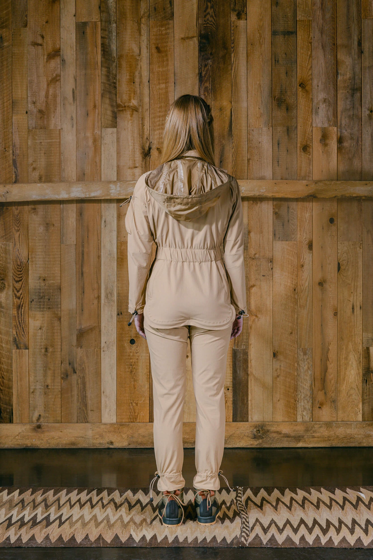 The Huntress Outdoor Tackle Suit back view in Dune