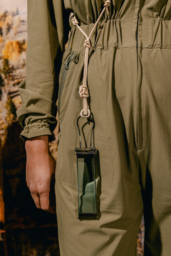 Woman wearing the Sage Tackle Suit and Cross Body without the cover